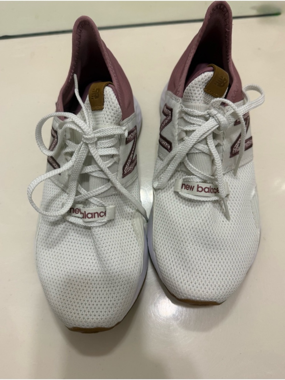 New Balance Women’s White and Mauve Slip-On Sneakers